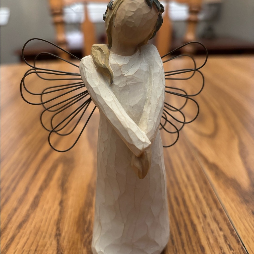 Willow Tree Celebrate figurine.